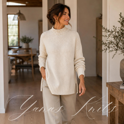 Front view of a woman wearing an ivory longline mock neck sweater with dropped shoulders and a ribbed split hem